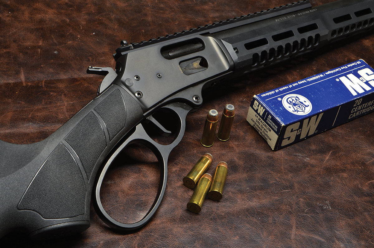 Smith & Wesson Model 1854 Stealth Hunter in 44 Magnum. At one time, S&W marketed its own ammunition (manufactured by  Winchester-Western). This box is now a collector’s item, but fits right in with S&W’s newest rifle offering. The box, incidentally, arrived in the author’s possession with the apocryphal one empty case and 49 loaded rounds. For many shooters in the early days of the 44 Magnum (beginning in 1956), one round fired was more than enough.
